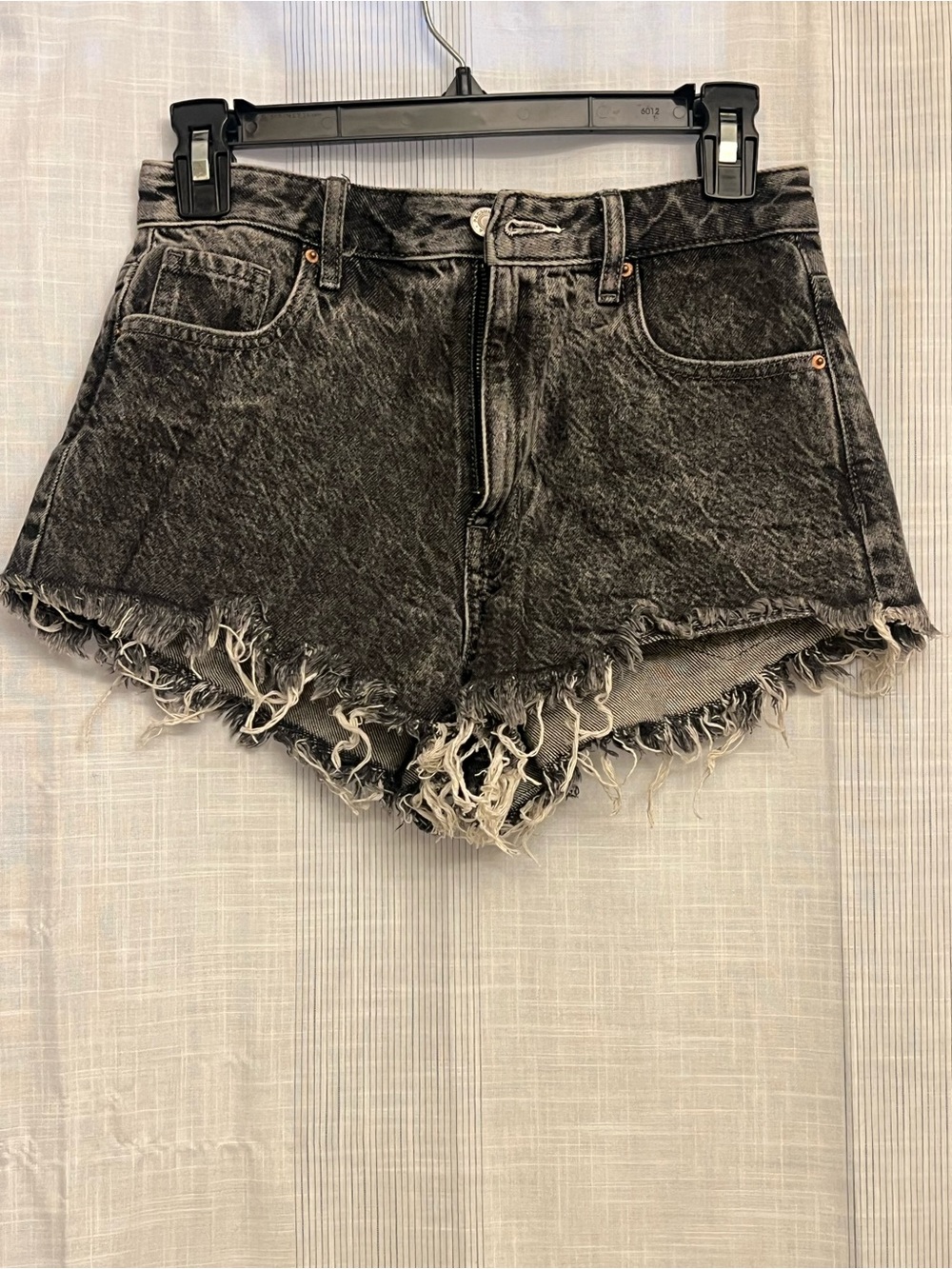 Brand new acid-washed looking distressed black denim shorts!
